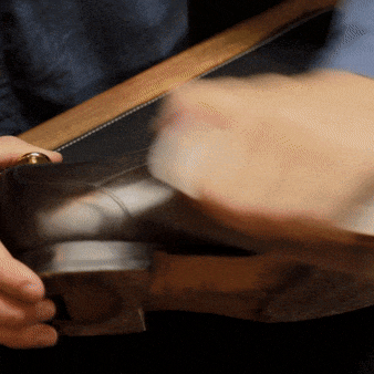 Shining shoes with a horsehair brush by The Shoe Care Shop